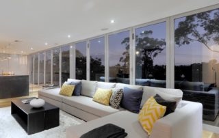 Aluminium bifold doors installed in the living room of a modern Perth home